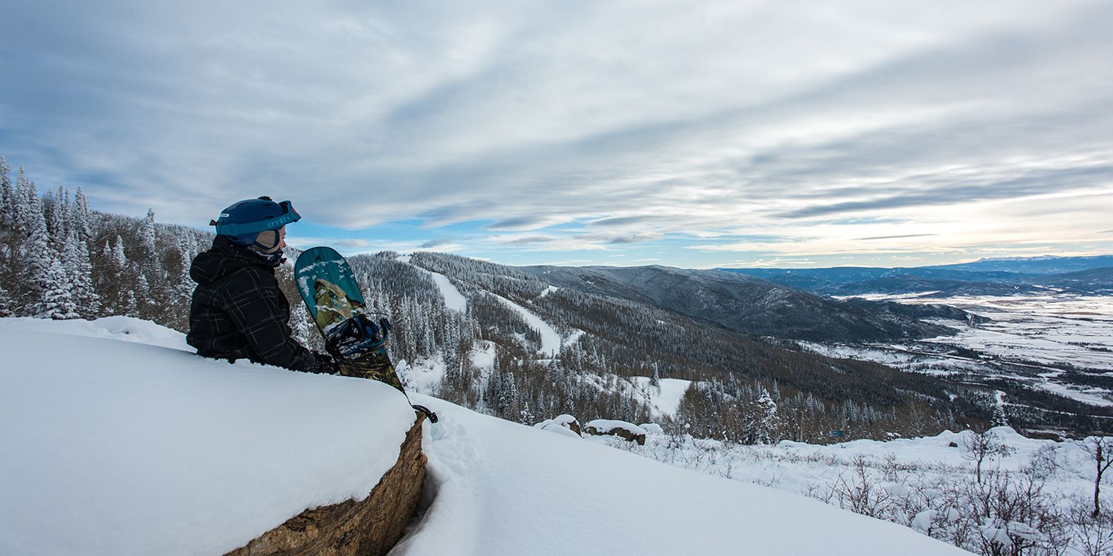 Man at the top of the cold cliff